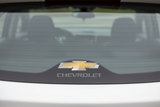 Chevrolet Classic Logo Decal applied to the lower centre of a white car rear windscreen
